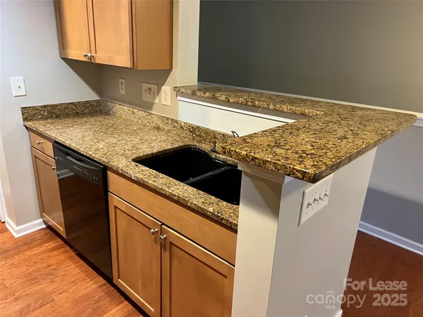 a kitchen with a stove and a microwave