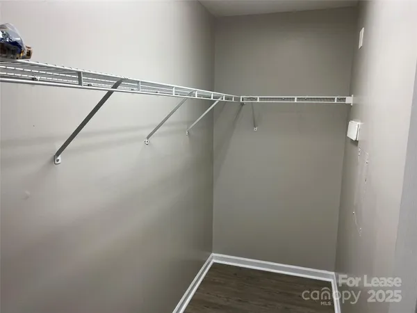 a view of a room with racks on the wall