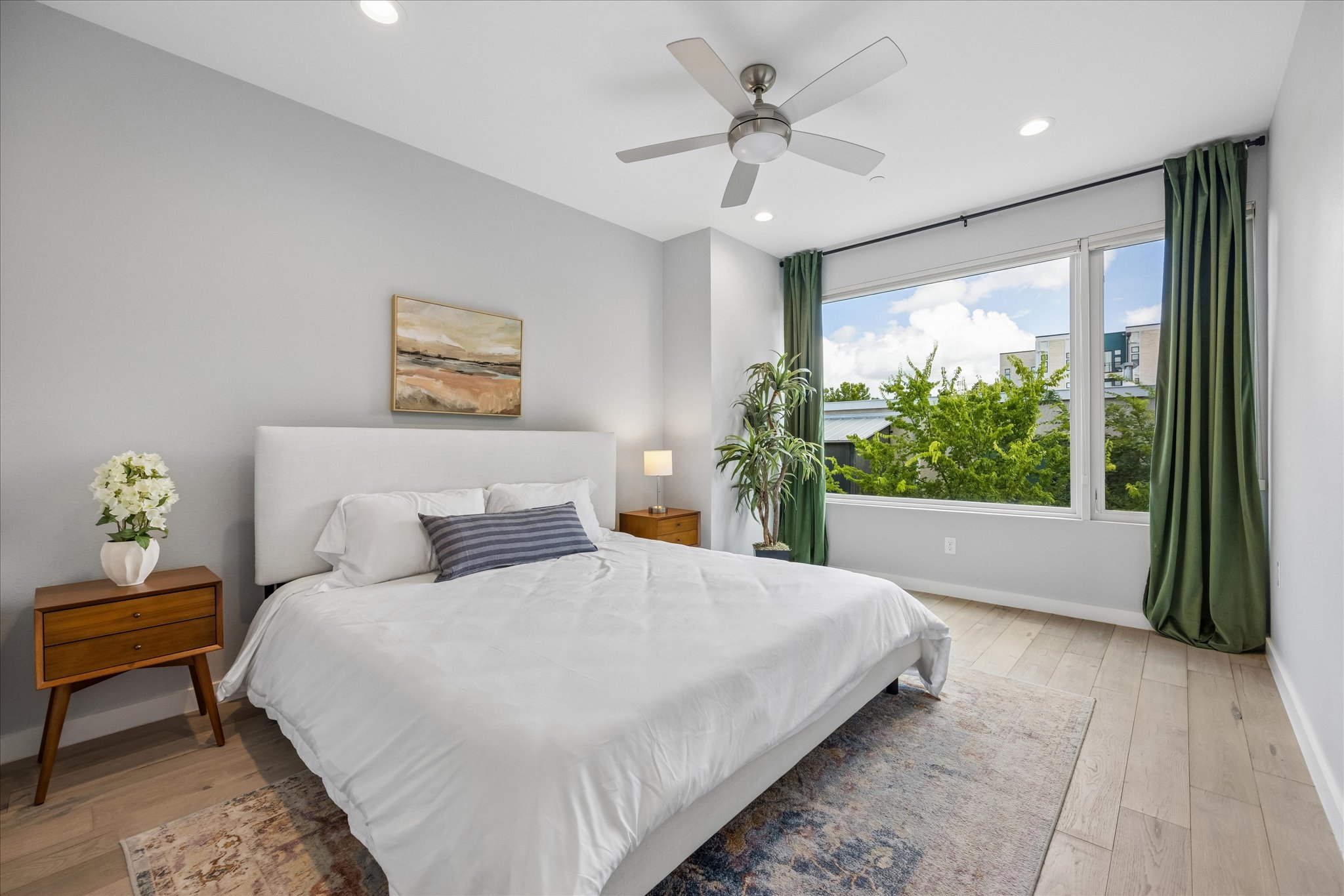 2108 Tillery Street, Unit 9 Austin, TX 78723 - Photo 11 of 25 Primary bedroom with oversized windows and abundant natural light
