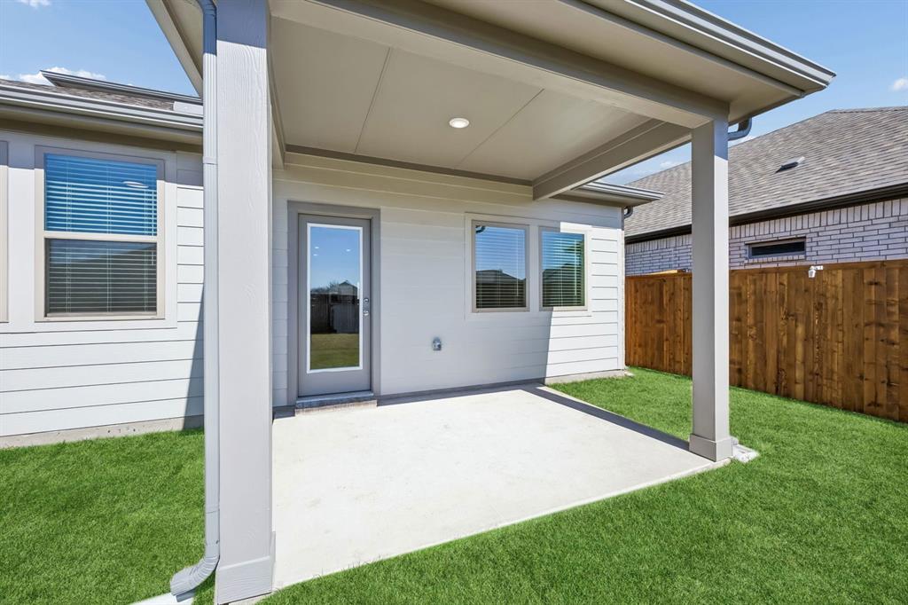 332 Millwood Road Lavon, TX 75166 - Photo 28 of 32 Covered Patio in the Mesquite home plan by Trophy Signature Homes – REPRESENTATIVE PHOTO