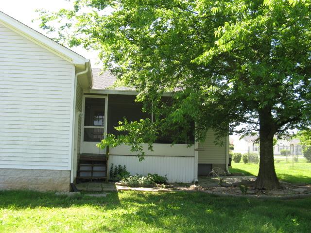 1129 Silverado Way Murfreesboro, TN 37130 - Photo 20 of 20 Exterior view of screened porch and beautiful shade tree.