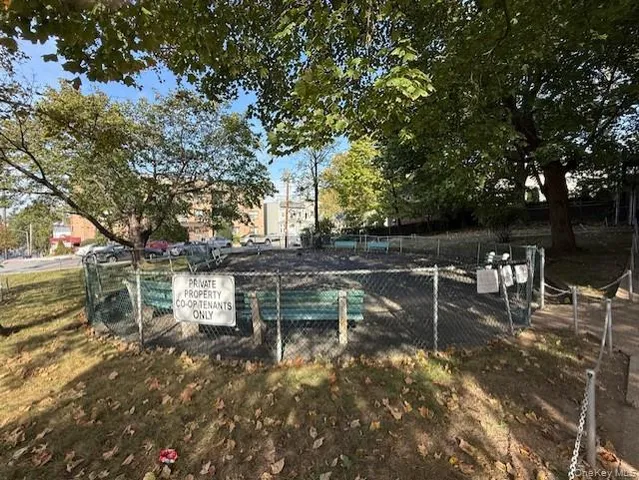 a view of house with deck and outdoor space