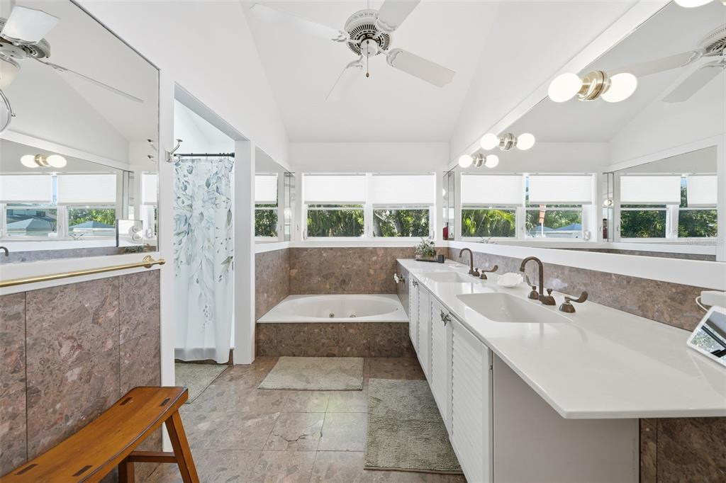 700 Lands End Drive Longboat Key, FL 34228 - Photo 26 of 70 a large white kitchen with a large window