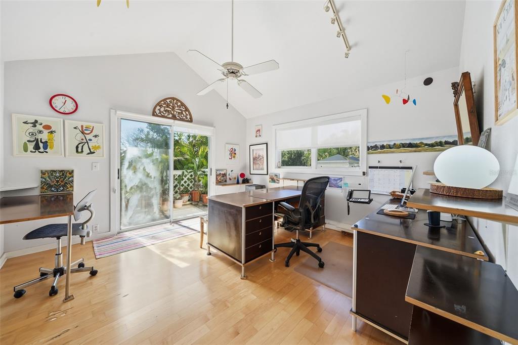 700 Lands End Drive Longboat Key, FL 34228 - Photo 35 of 70 a view of a workspace with furniture and a window