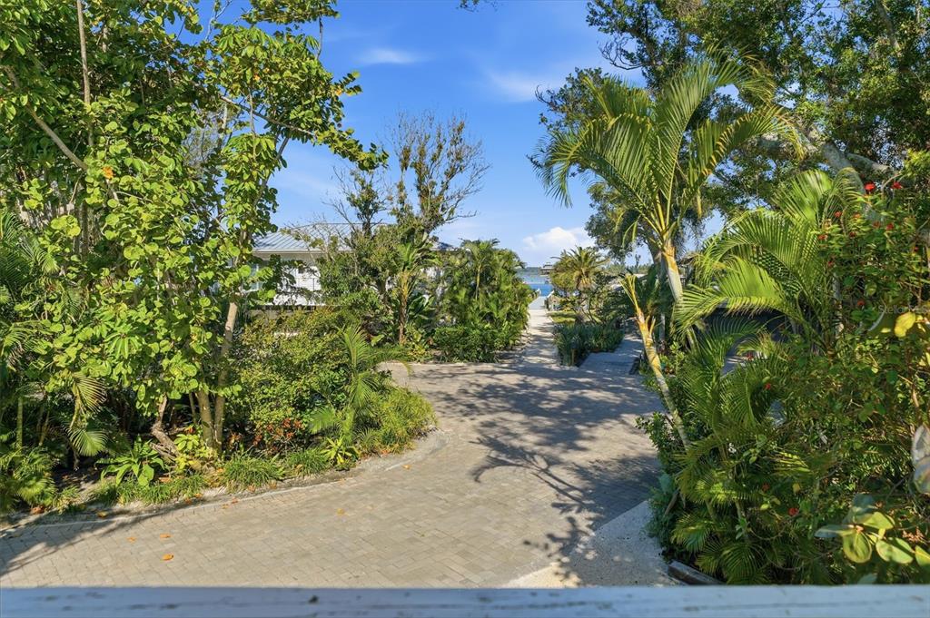700 Lands End Drive Longboat Key, FL 34228 - Photo 50 of 70 a view of a yard with plants and trees