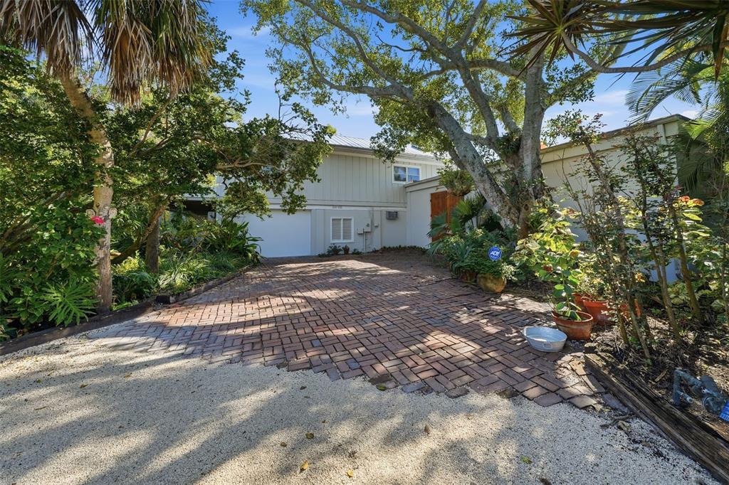700 Lands End Drive Longboat Key, FL 34228 - Photo 62 of 70 a view of a house with a tree