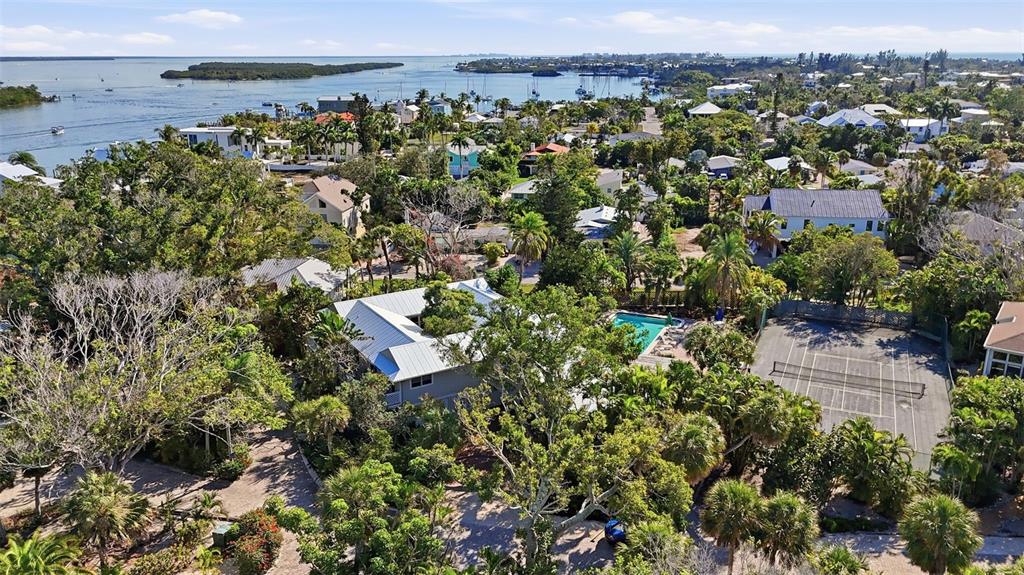 700 Lands End Drive Longboat Key, FL 34228 - Photo 64 of 70 an aerial view of a city with lots of residential buildings