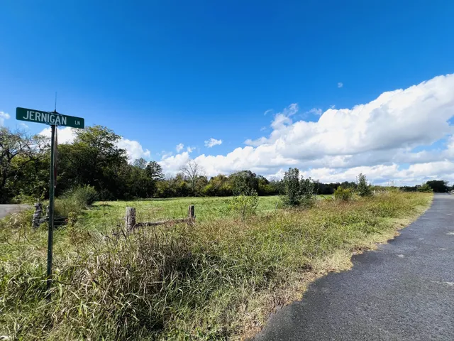 a view of a lake with a big yard