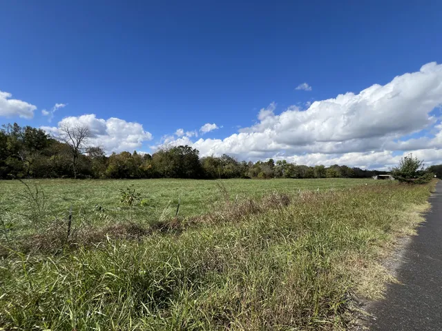 a view of a golf course with a lake