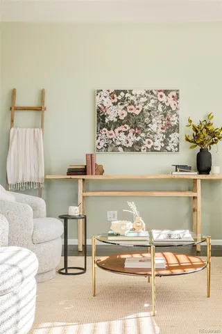 a living room with a couch and a table