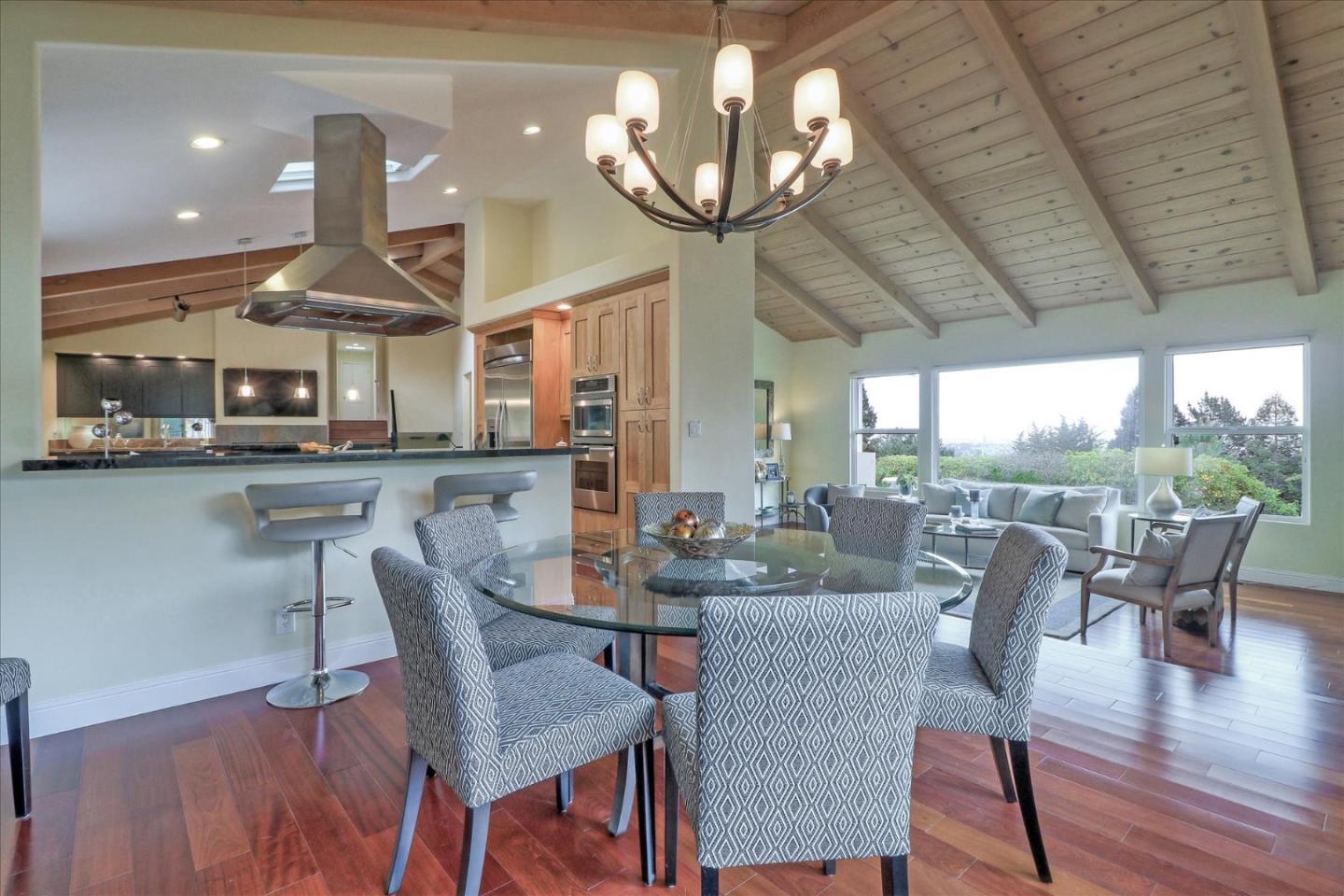 50 Tobin Clark Drive Hillsborough, CA 94010 - Photo 12 of 38 a view of a dining room with furniture wooden floor and chandelier