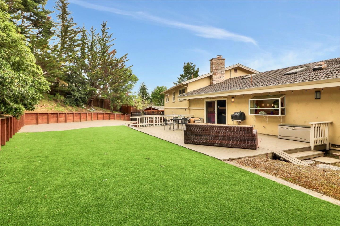 50 Tobin Clark Drive Hillsborough, CA 94010 - Photo 30 of 38 a front view of a house with garden