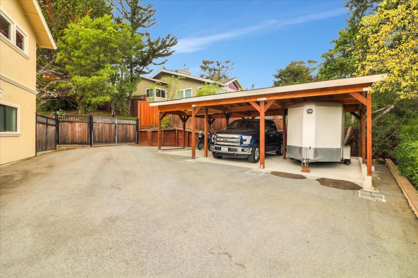 50 Tobin Clark Drive Hillsborough, CA 94010 - Photo 34 of 38 front view of a house with a patio