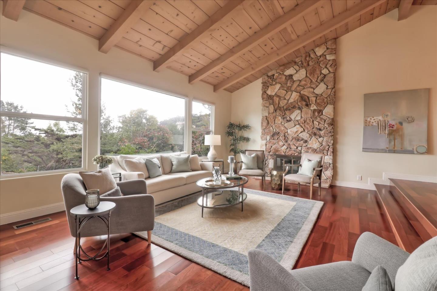50 Tobin Clark Drive Hillsborough, CA 94010 - Photo 8 of 38 a living room with furniture and a large window