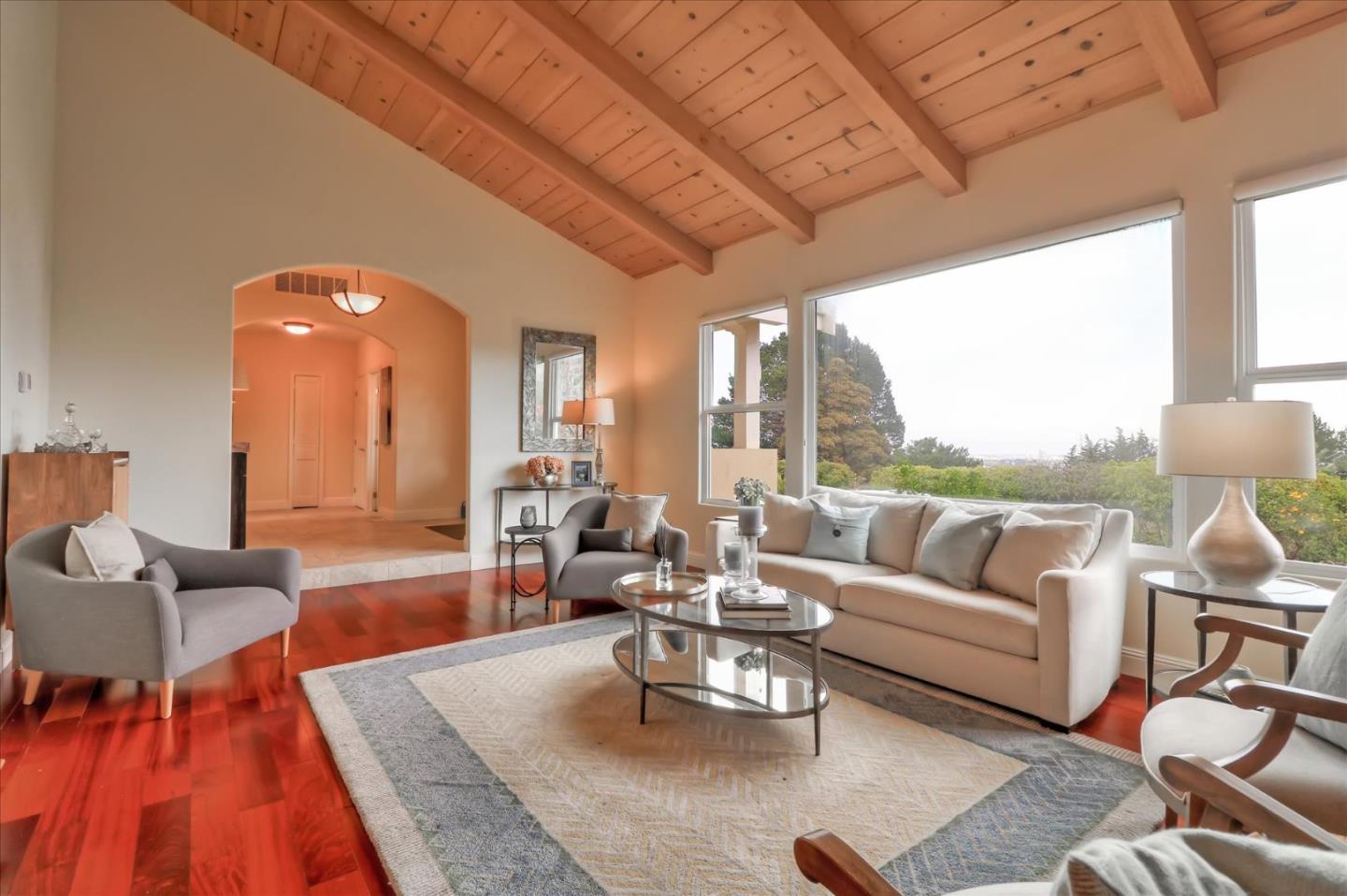 50 Tobin Clark Drive Hillsborough, CA 94010 - Photo 10 of 38 a living room with furniture and a large window