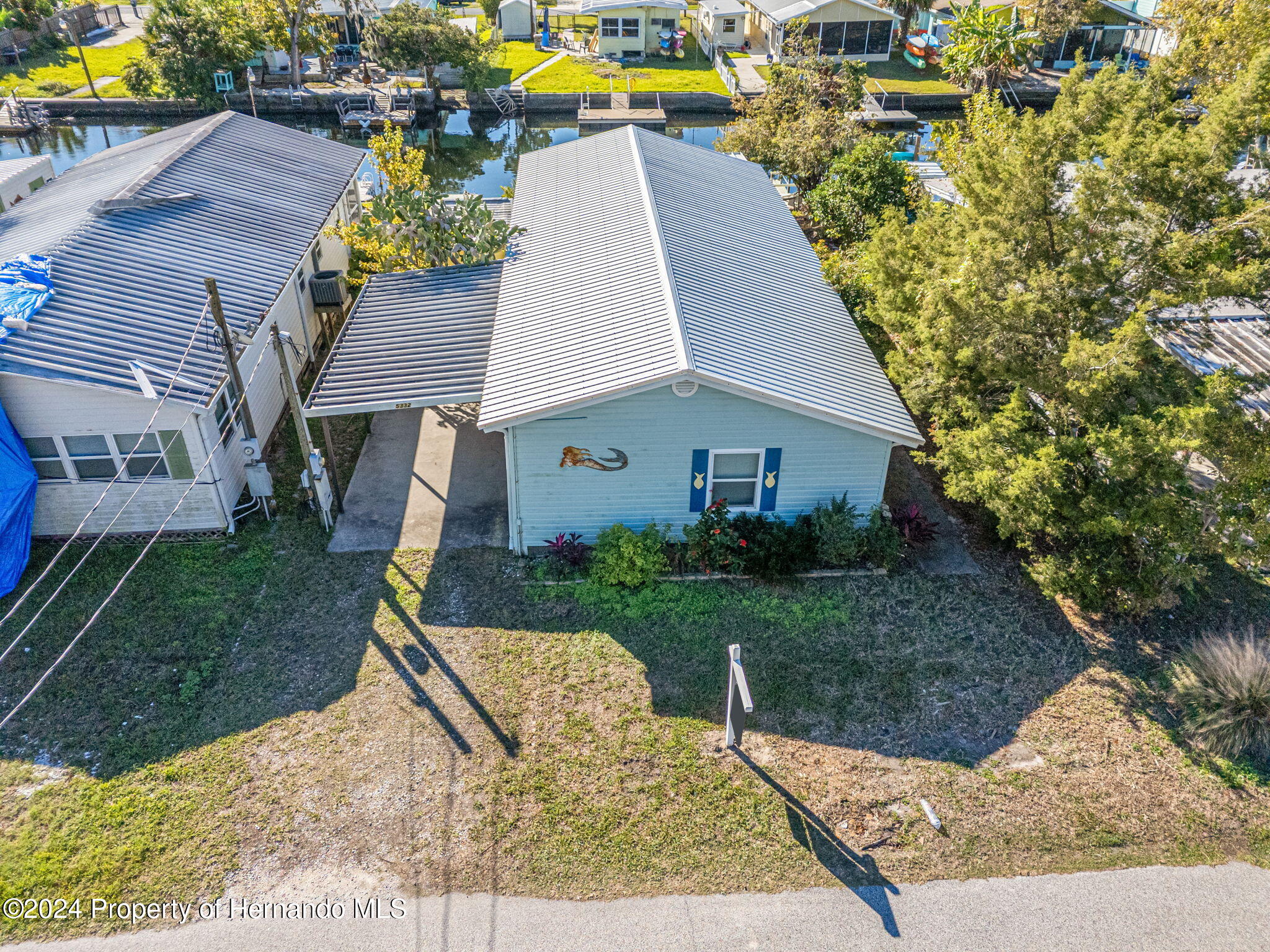 5332 Circle Drive Weeki Wachee, FL 34607 - Photo 2 of 27 a view of a house with swimming pool