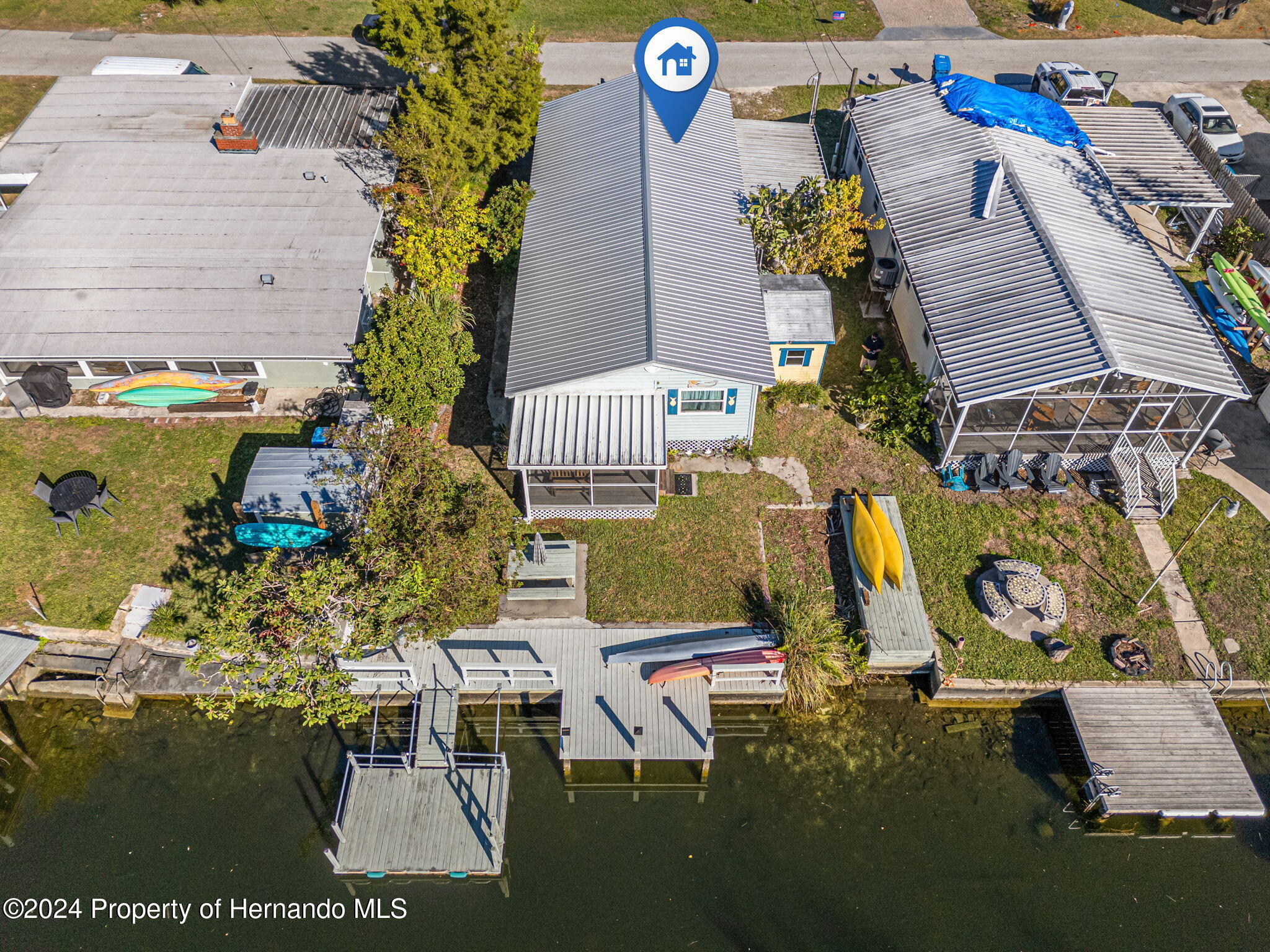 5332 Circle Drive Weeki Wachee, FL 34607 - Photo 5 of 27 an aerial view of a house with a swimming pool