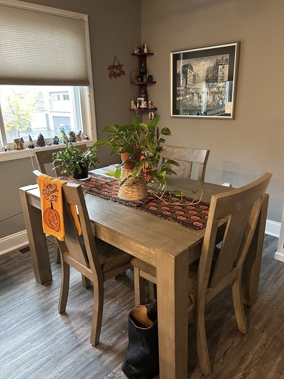 255 North Road, Unit 65 Chelmsford, MA 01824 - Photo 11 of 31 a view of a dining room with furniture window and wooden floor