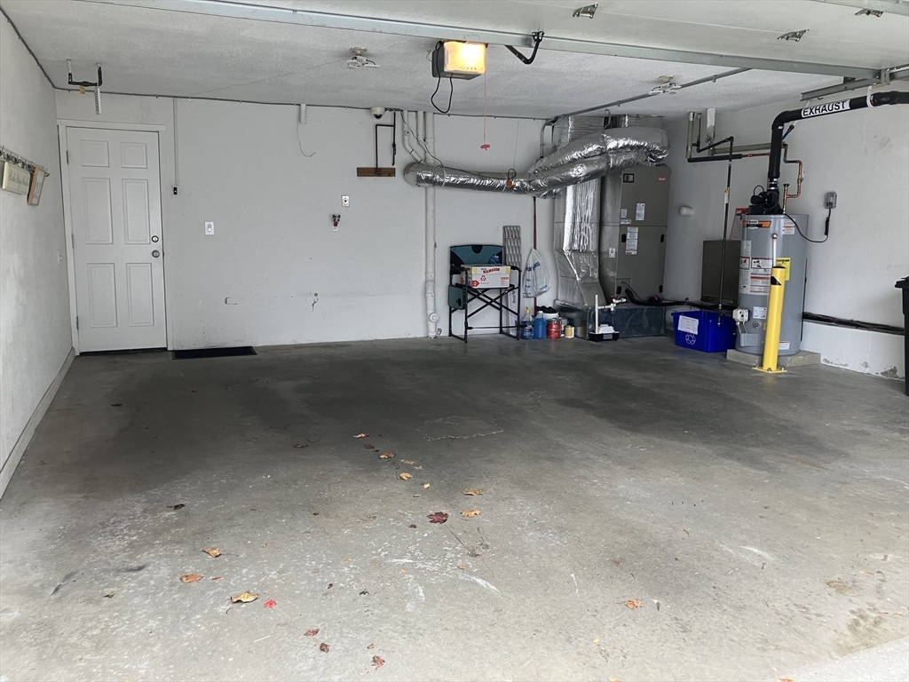 255 North Road, Unit 65 Chelmsford, MA 01824 - Photo 29 of 31 a view of a garage