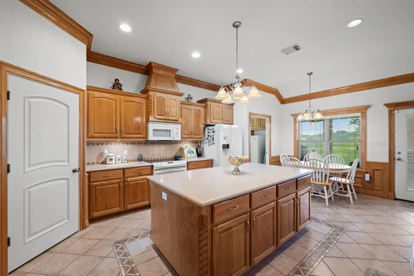 a view of storage and utility room with washer and dryer