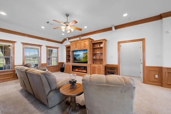 a large kitchen with stainless steel appliances kitchen island granite countertop a large counter top cabinets and steel appliances