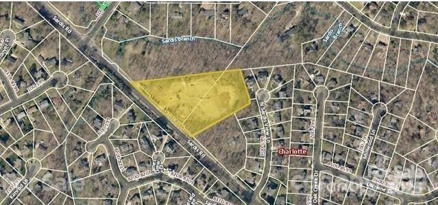 a picture of a street with a building in the background