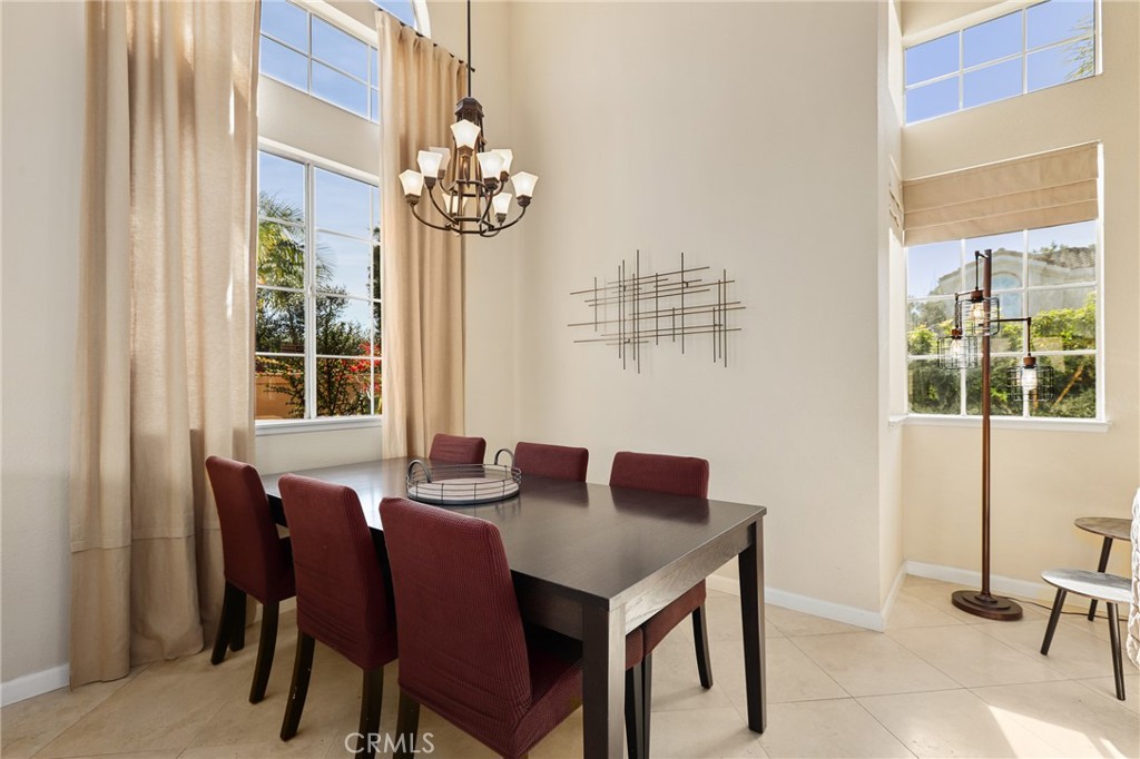 2 Bormes Irvine, CA 92614 - Photo 13 of 69 a view of a dining room with furniture window and outside view