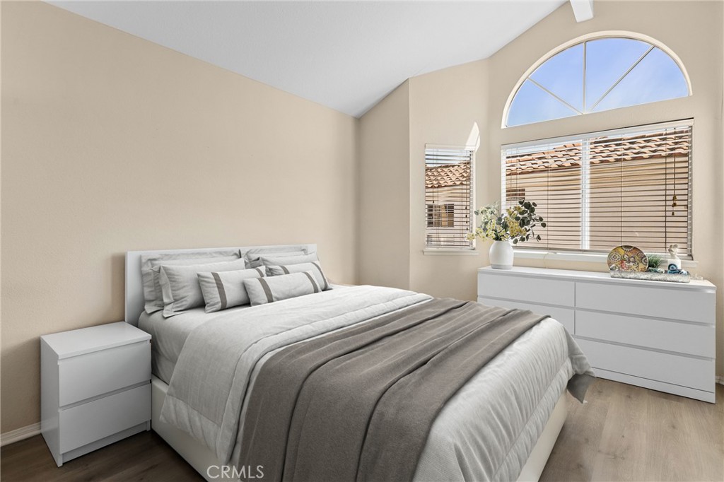 2 Bormes Irvine, CA 92614 - Photo 24 of 69 a bedroom with a large bed and a large window