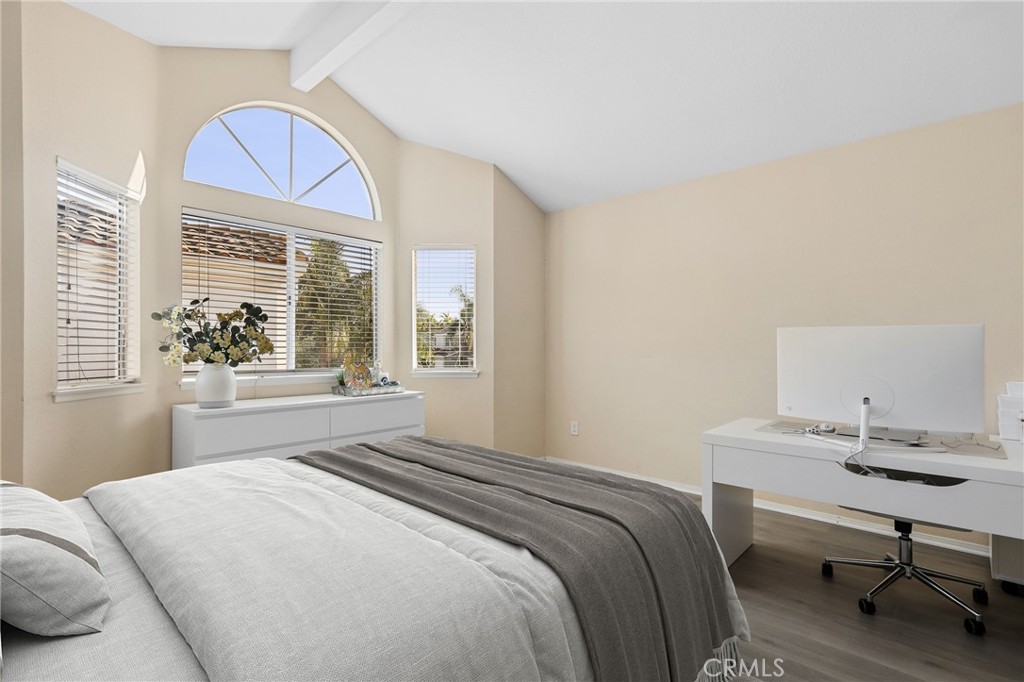 2 Bormes Irvine, CA 92614 - Photo 25 of 69 a bedroom with a bed a table and a window