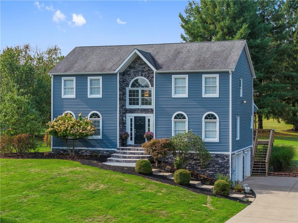 106 Good Luck Lane Mars, PA 16046 - Photo 1 of 33 a front view of a house with a yard
