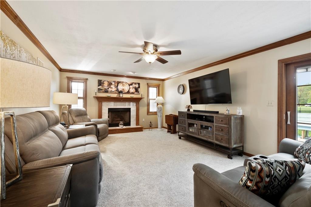 106 Good Luck Lane Mars, PA 16046 - Photo 12 of 33 a living room with furniture a flat screen tv and a fireplace
