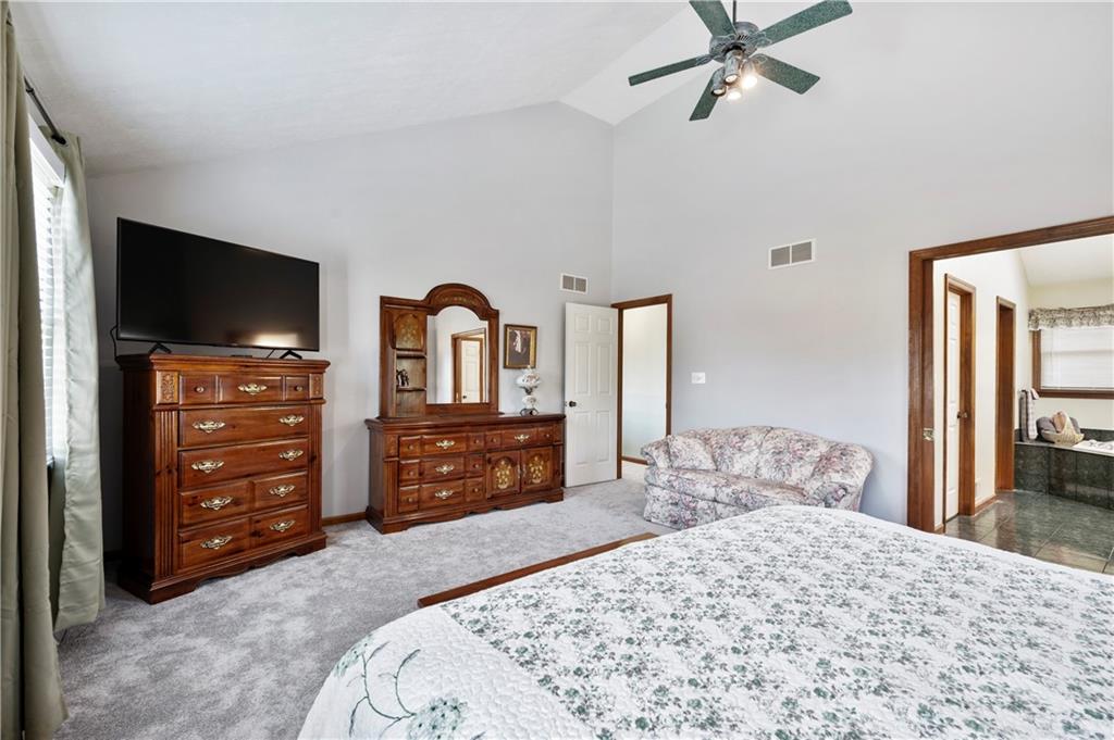 106 Good Luck Lane Mars, PA 16046 - Photo 19 of 33 a bedroom with a bed and a dresser