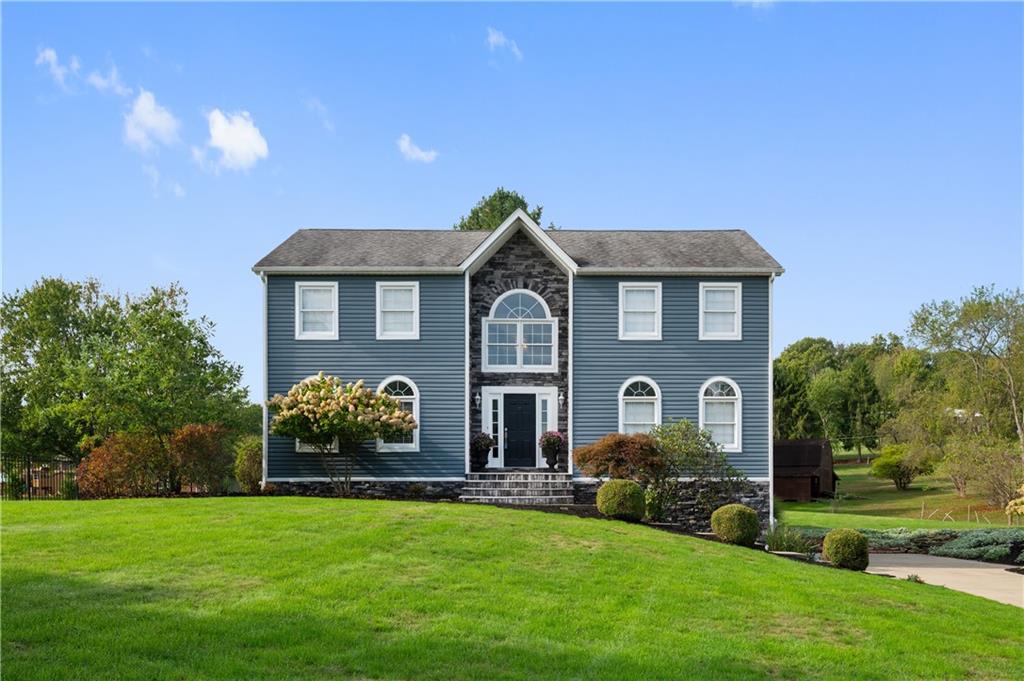 106 Good Luck Lane Mars, PA 16046 - Photo 2 of 33 a front view of a house with garden