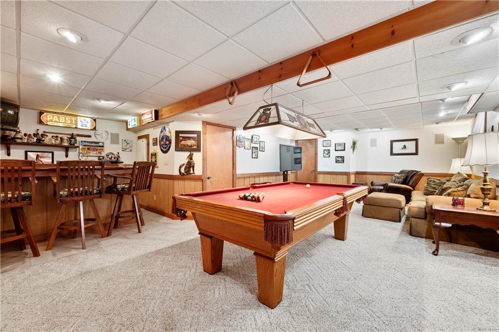 106 Good Luck Lane Mars, PA 16046 - Photo 27 of 33 a living room with furniture a table tennis table and a flat screen tv