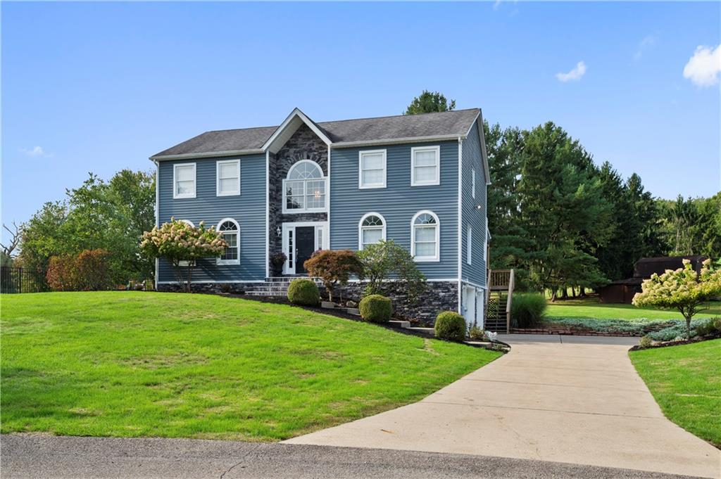 106 Good Luck Lane Mars, PA 16046 - Photo 28 of 33 a front view of a house with garden