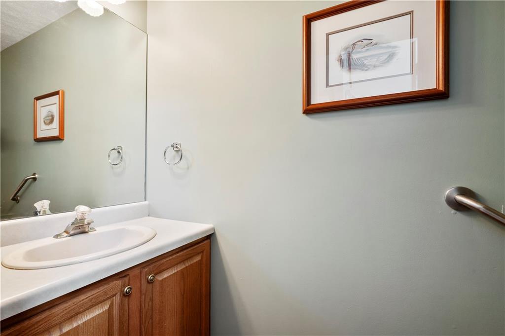106 Good Luck Lane Mars, PA 16046 - Photo 7 of 33 a bathroom with a sink and a mirror