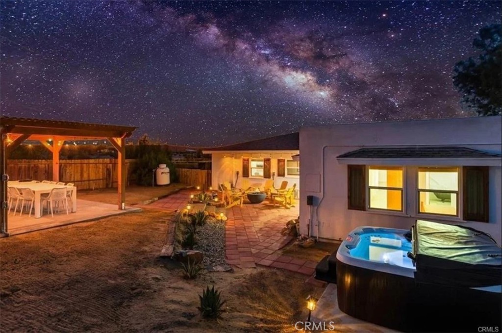 a room with furniture and a large window