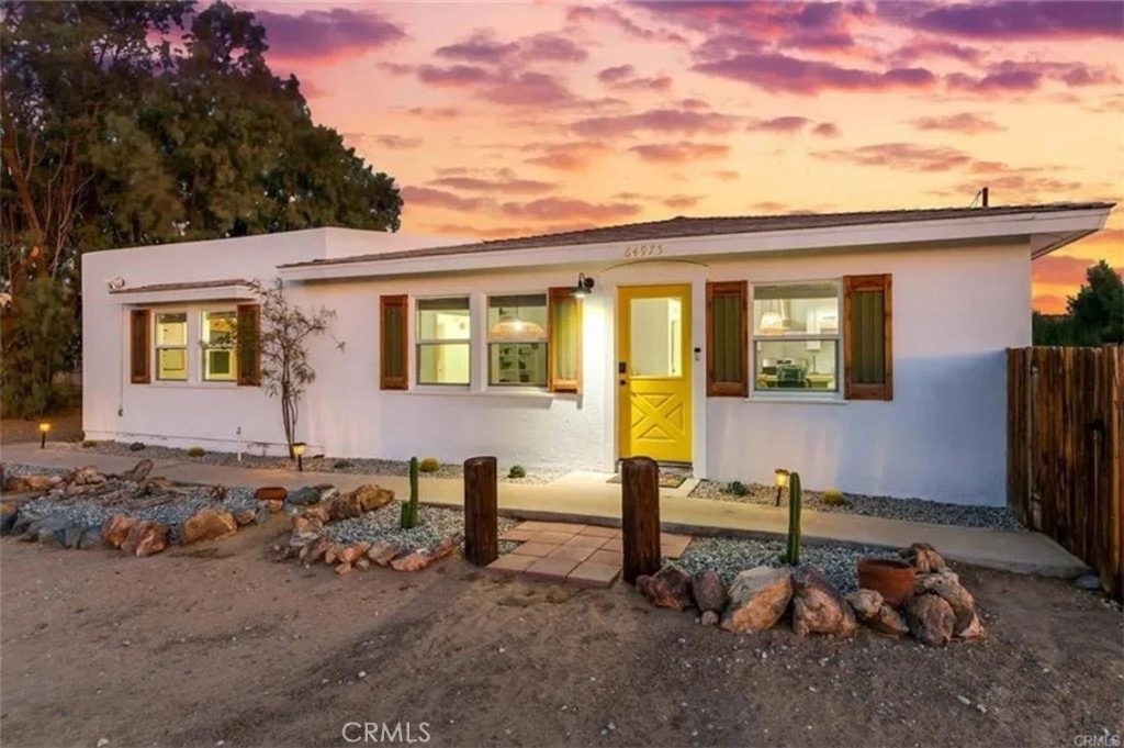 64975 Sun Oro Road Joshua Tree, CA 92252 - Photo 2 of 52 a view of a house with backyard