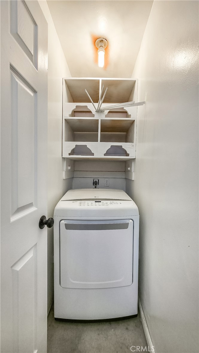 64975 Sun Oro Road Joshua Tree, CA 92252 - Photo 27 of 52 a utility room with dryer and washer
