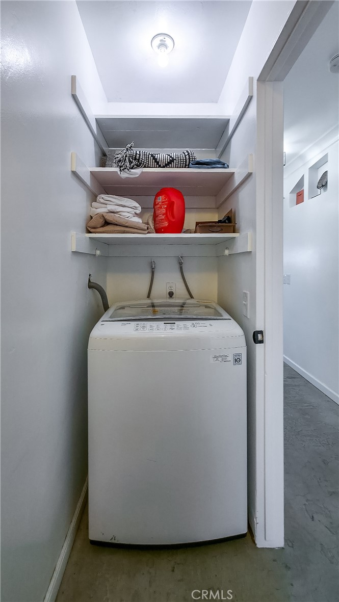 64975 Sun Oro Road Joshua Tree, CA 92252 - Photo 28 of 52 a utility room with dryer and washer