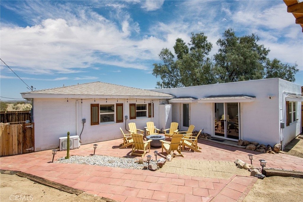 64975 Sun Oro Road Joshua Tree, CA 92252 - Photo 42 of 52 a view of a dinning table and chairs in the patio