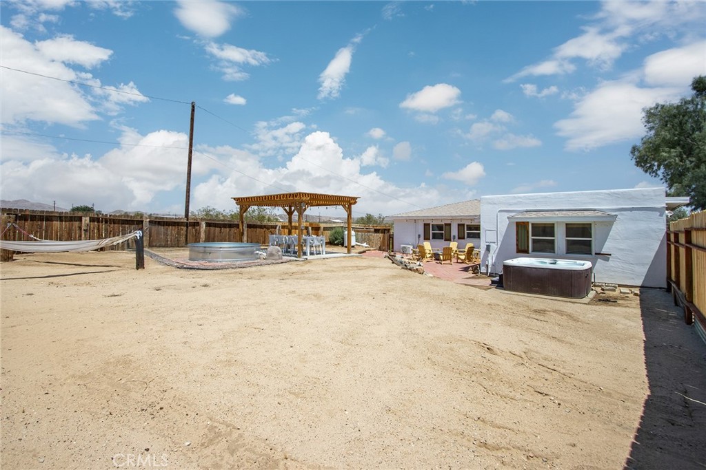 64975 Sun Oro Road Joshua Tree, CA 92252 - Photo 49 of 52 a house view with a seating space