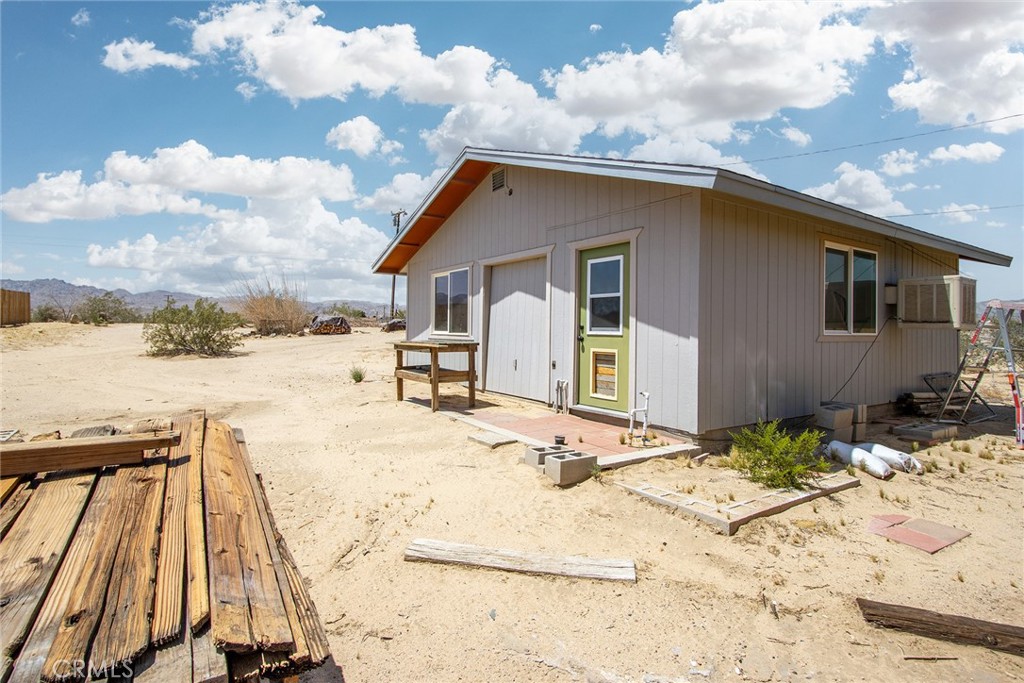 64975 Sun Oro Road Joshua Tree, CA 92252 - Photo 50 of 52 a house with a outdoor space