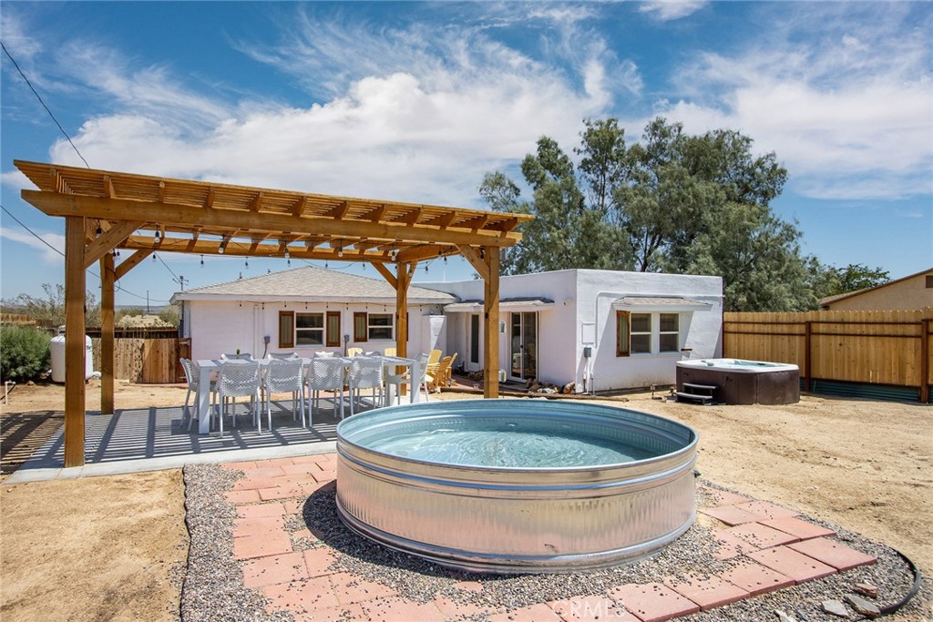 64975 Sun Oro Road Joshua Tree, CA 92252 - Photo 8 of 52 a view of a house with patio