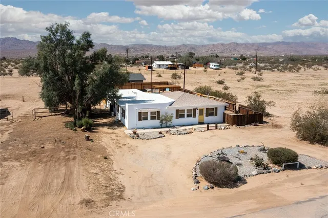 a view of a city street with tall buildings