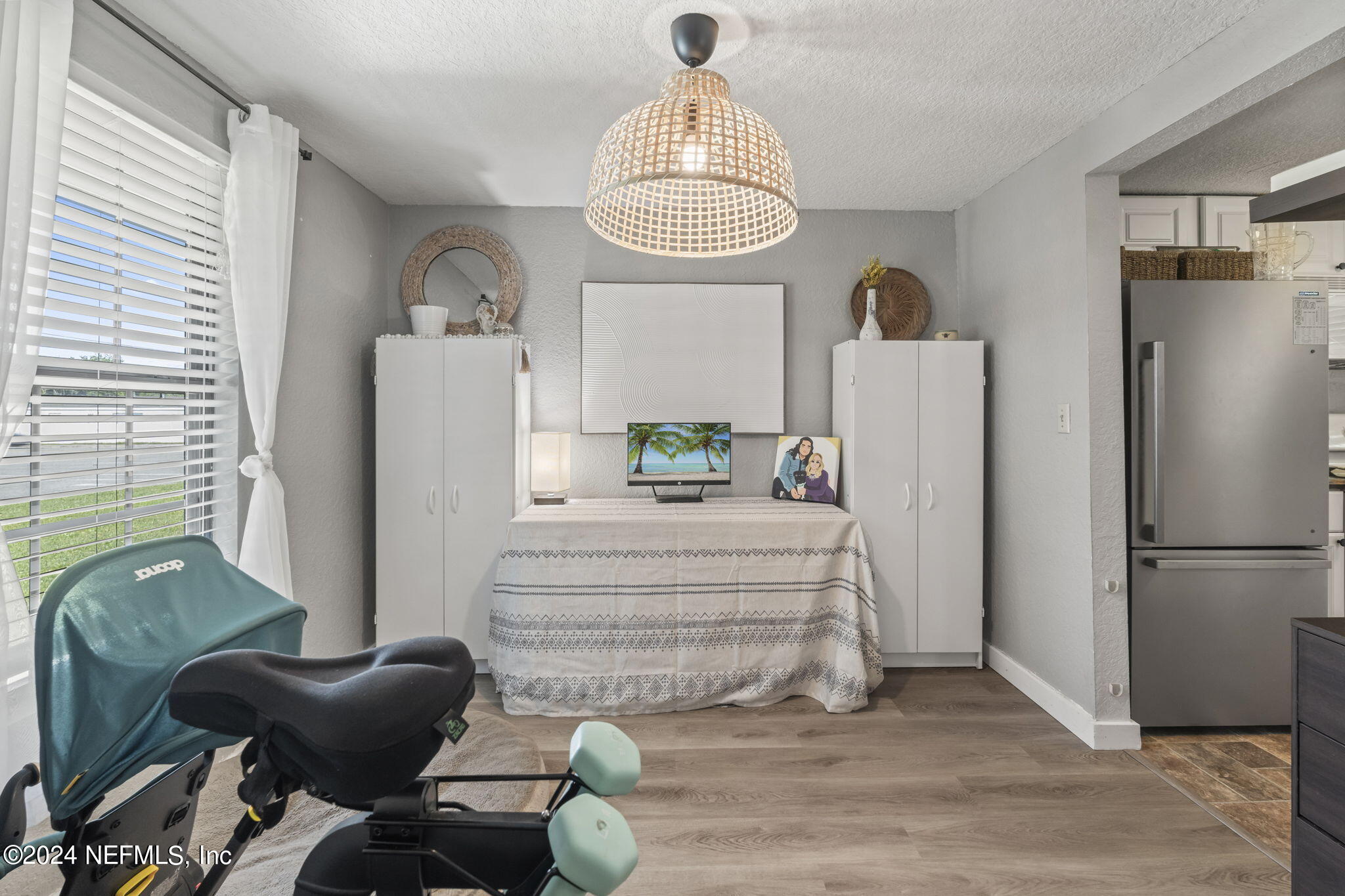13548 Chauny Road Jacksonville, FL 32246 - Photo 17 of 55 a view of living room with furniture and a window