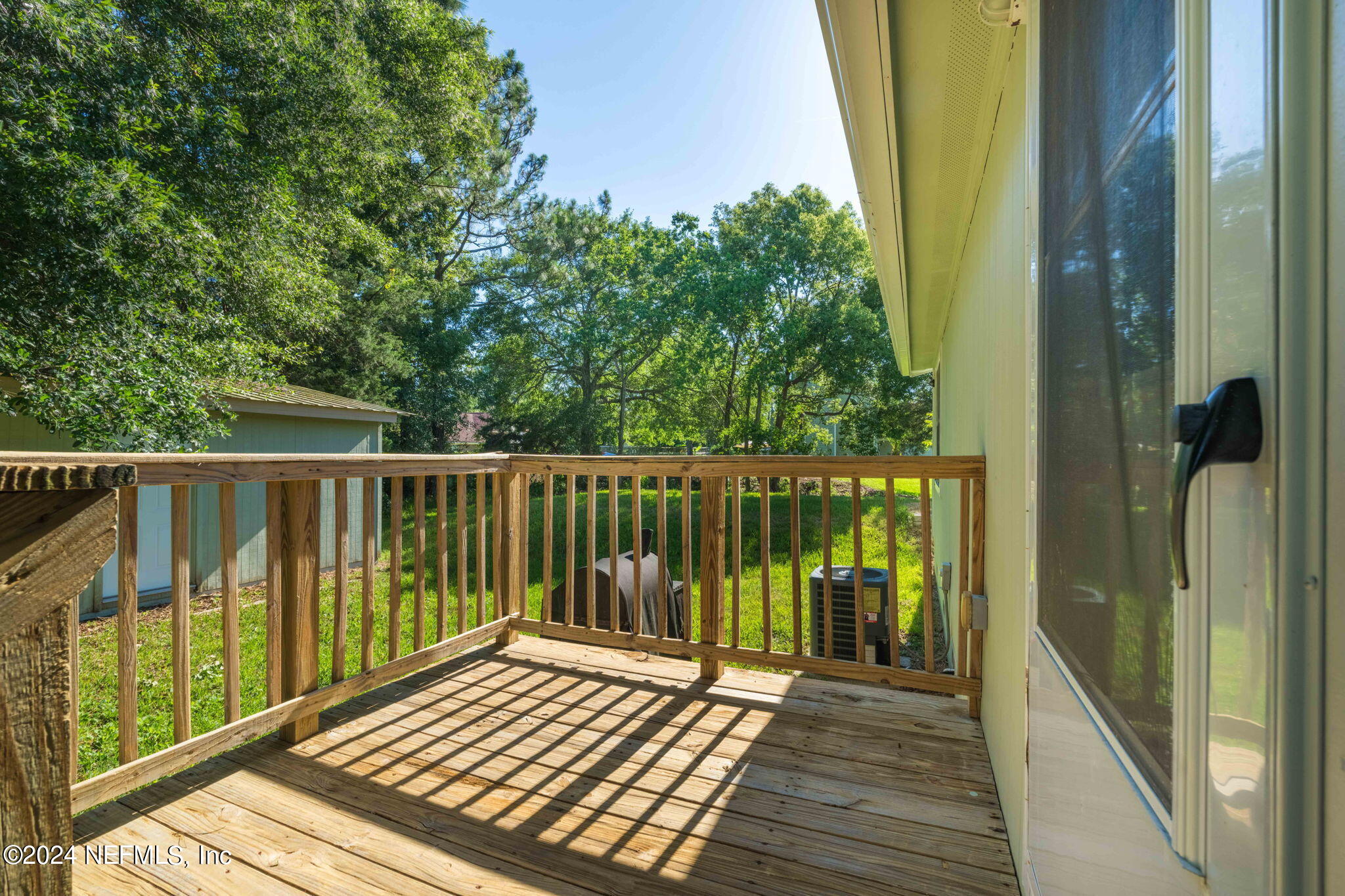 13548 Chauny Road Jacksonville, FL 32246 - Photo 25 of 55 a view of a balcony with wooden floor