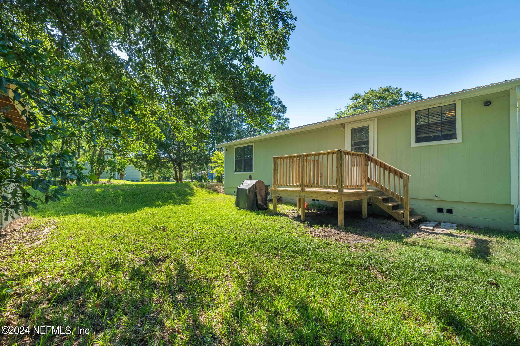 13548 Chauny Road Jacksonville, FL 32246 - Photo 26 of 55 a house view with a backyard space