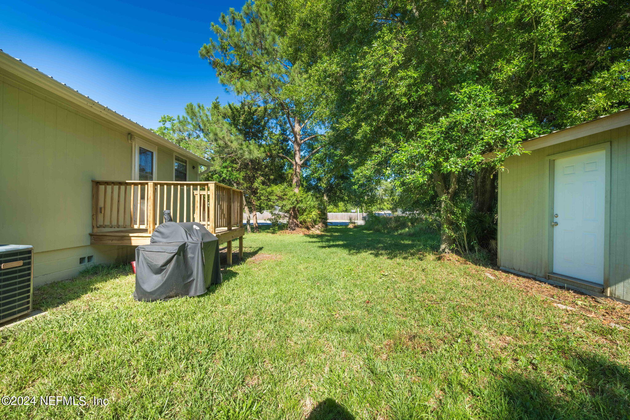 13548 Chauny Road Jacksonville, FL 32246 - Photo 28 of 55 a view of a garden with patio