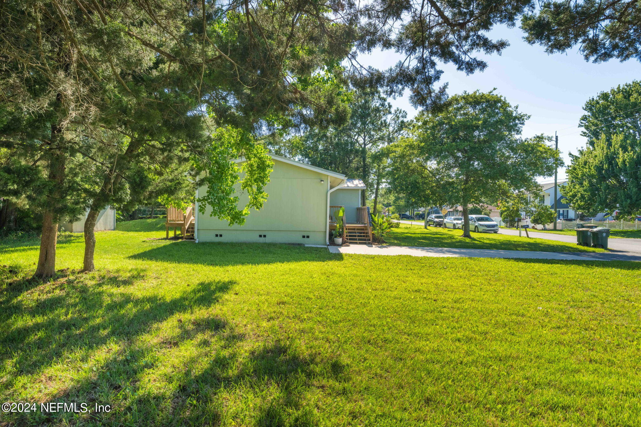 13548 Chauny Road Jacksonville, FL 32246 - Photo 38 of 55 a view of a house with swimming pool and yard